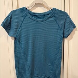Athleta women’s Blue Striped Short Sleeve tech Athletic Top